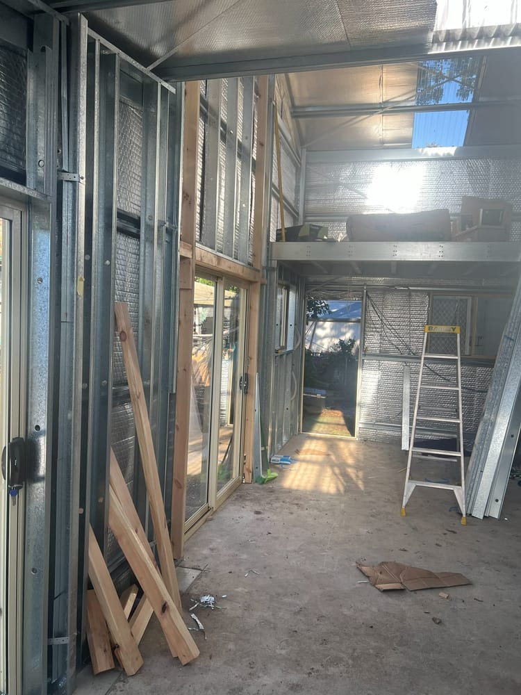 Timber and steel framing to a new opening inside a shed conversion