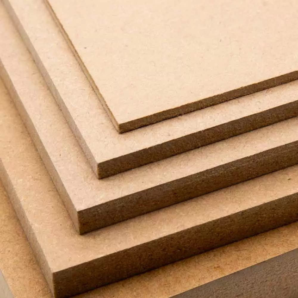 Close view of the cut edge of stacked MDF sheets