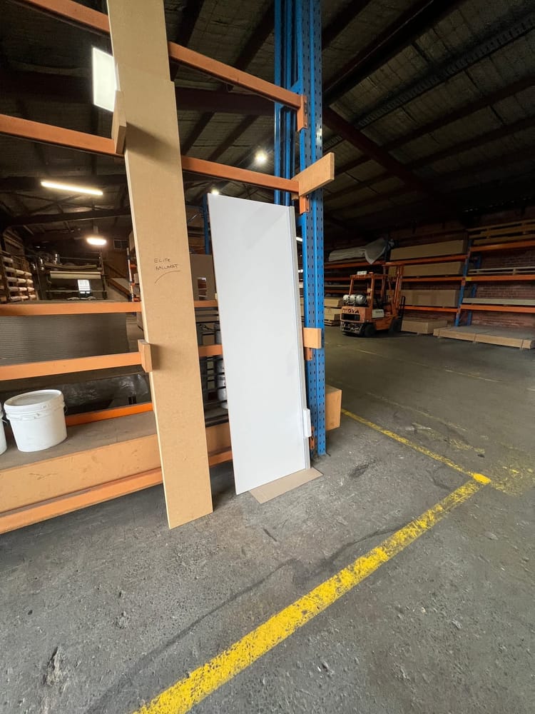 A large panel laid out on trestles and prepared before installation